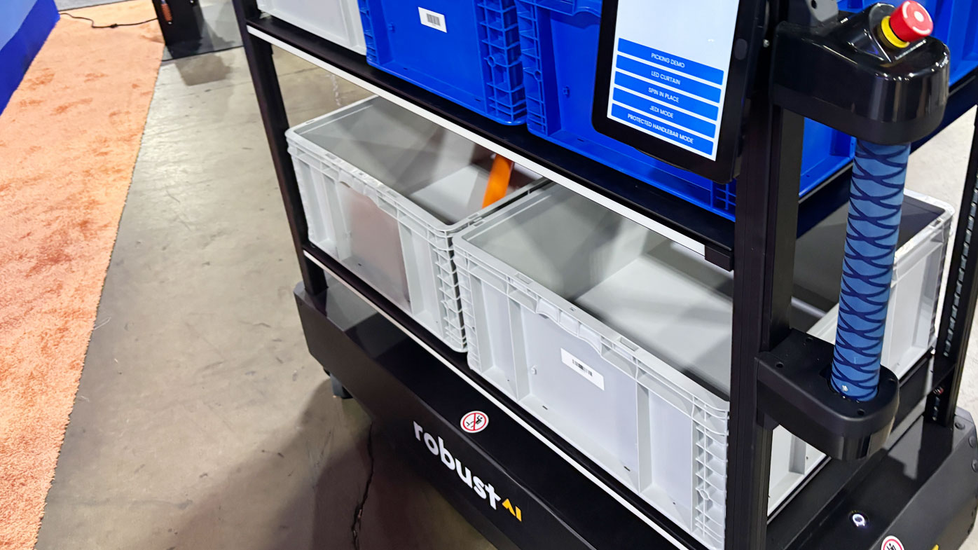 The Robust AI booth featured several Carter AMRs for attendees to interact with, and the company displayed its deployment partnerships with DHL Supply Chain and Saddle Creek Logistics.