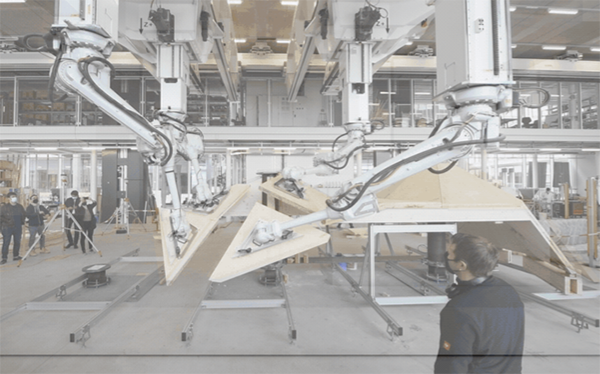 Intrinsic’s motion planning software orchestrates four industrial robots to build wooden pods for a sustainable architecture project ​​by Gramazio Kohler Research, ETH Zurich.