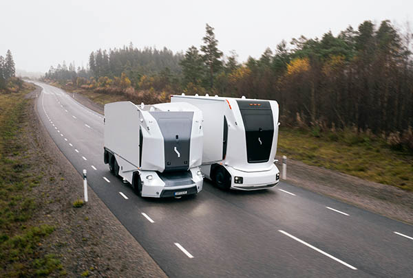 Einride's Gen 1 (left) and Gen 2 Rigid Large (right) autonomous trucks.