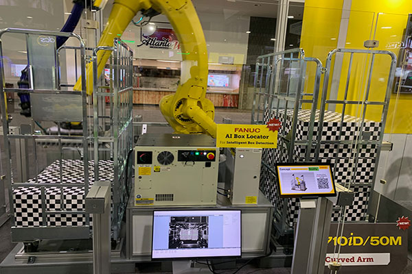 FANUC's 710/D/50M robot arm with its IPC box detection software.