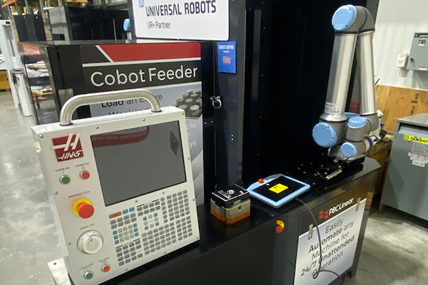 PBC Linear's Applied Cobotics Cobot Feeder includes a UR cobot arm for machine tending.