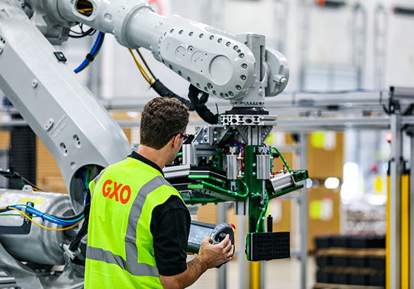 GXO credited automation, including ASRS, cobots, industrial robots, and goods-to-person systems, for its strong earnings last year.