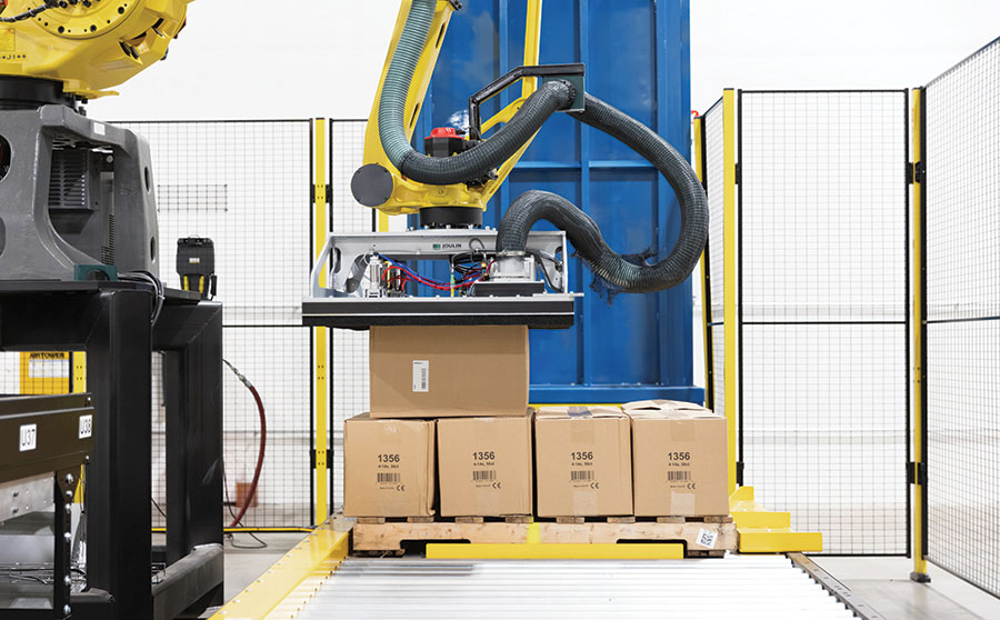 The robot builds the pallet from a number of stored palletizing pallets, according to the SKU.