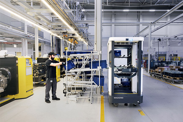Magazino's SOTO robot automates material handling between the warehouse and assembly line at MAN.