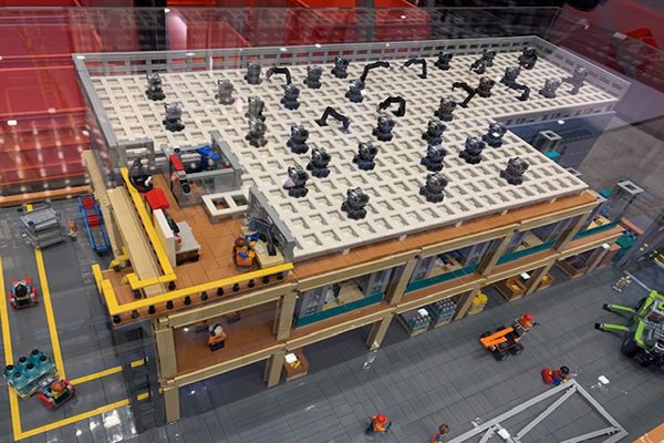 Ocado Intelligent Automation built a Lego replica warehouse displaying its various robots at Manifest 2024.