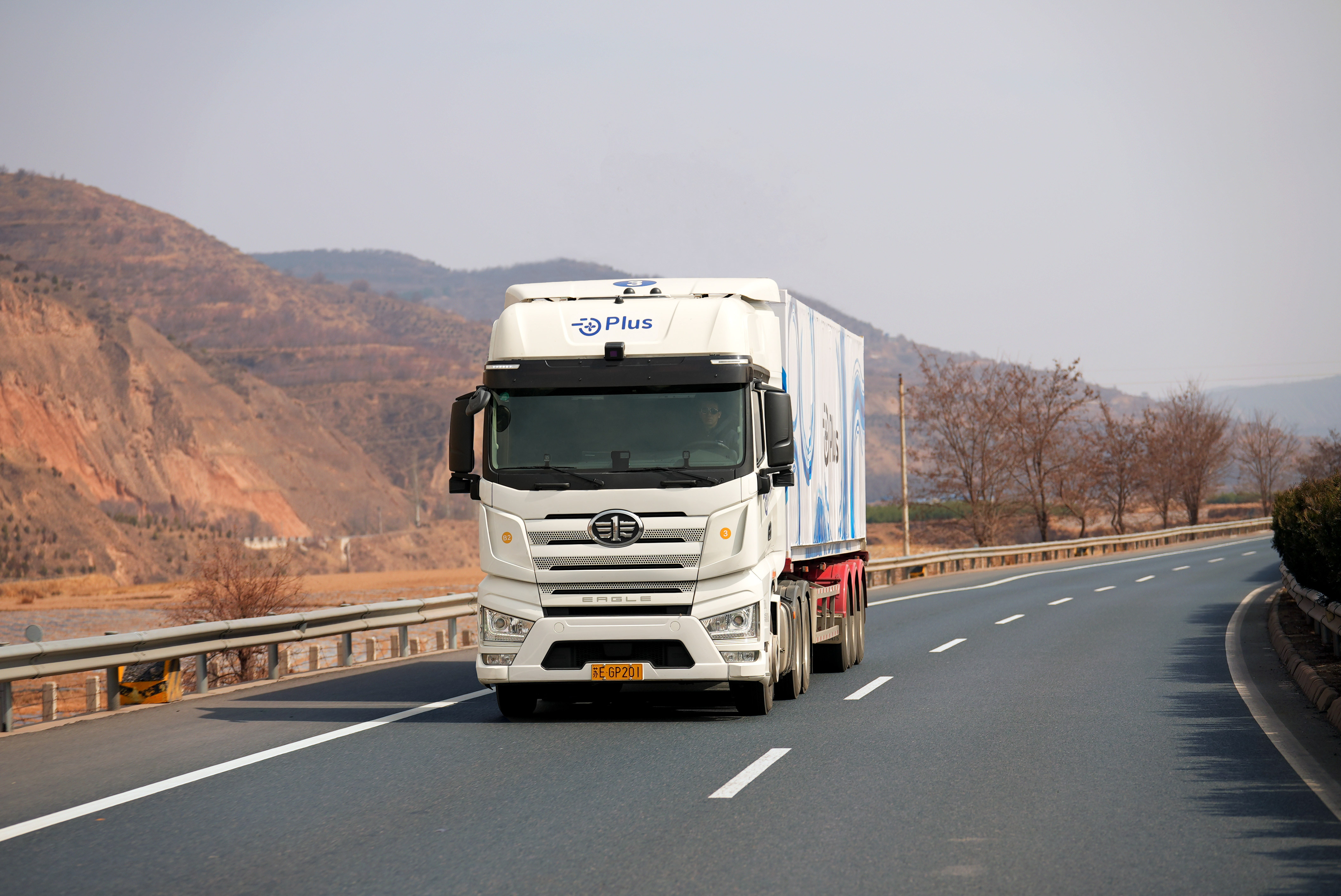 Companies developing autonomous trucks, such as this one powered by PlusDrive and being tested in China, received funding in May 2021.