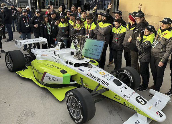 Team PoliMOVE celebrates its victory at the IAC at CES 2023 in Las Vegas.
