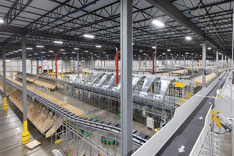 Sortation and robotics layout at Pitney Bowes