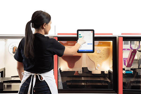A Domino’s Pizza in Berlin is Piloting a Picnic Works Pizza Station