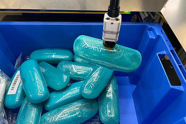 OSARO and Zenni Optical Deploy Precise Robotic Bagging System