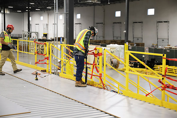 Installation Time and Labor are Slashed by 50% Using Stand-Up Screwdrivers on ResinDek Flooring