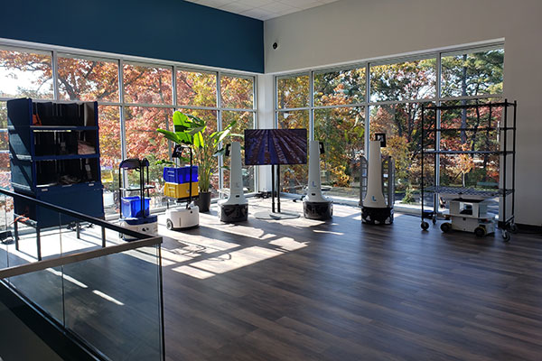 Above the lobby, visitors can find the Locus Robotics museum, which showcases the company’s robot models developed throughout the past decade.