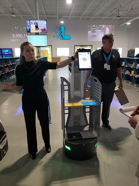 Locus Robotics team members demonstrated empty box, bin, and container induction in the Demonstration Center with Origin and Vector AMRs.