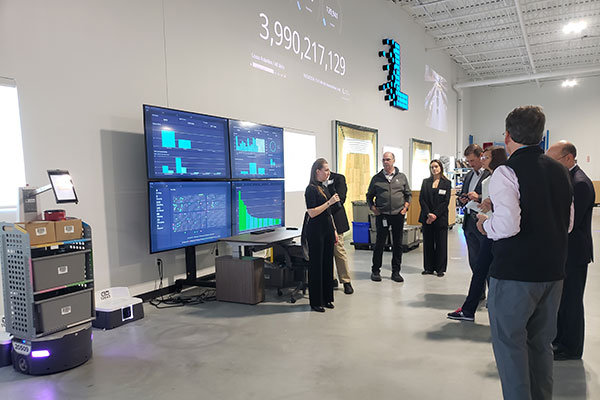 One part of the Demonstration Center showcased orchestration software programs, such as LocusOne and LocusHub, and charging docks for the AMRs.
