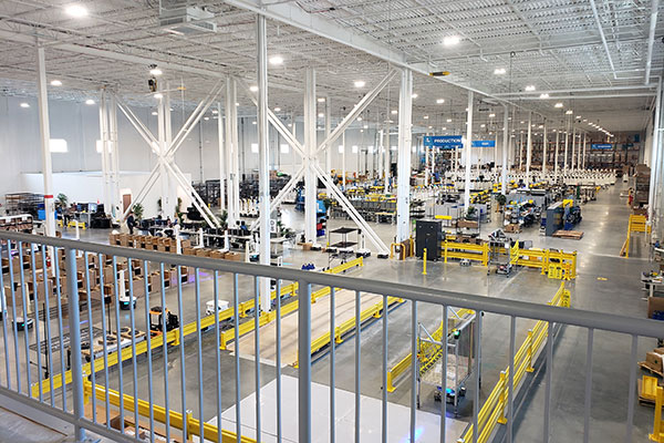 Covering about 160,000 square feet, the new Locus Robotics facility includes areas for robot manufacturing, refurbishment, testing, storage, shipping, and office spaces.