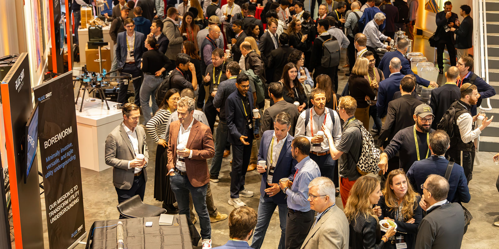 Robotics invest 2025 attendees filled the foyer between sessions, visiting displays and networking. 

Photo by Donald Halsing | Peerless Media