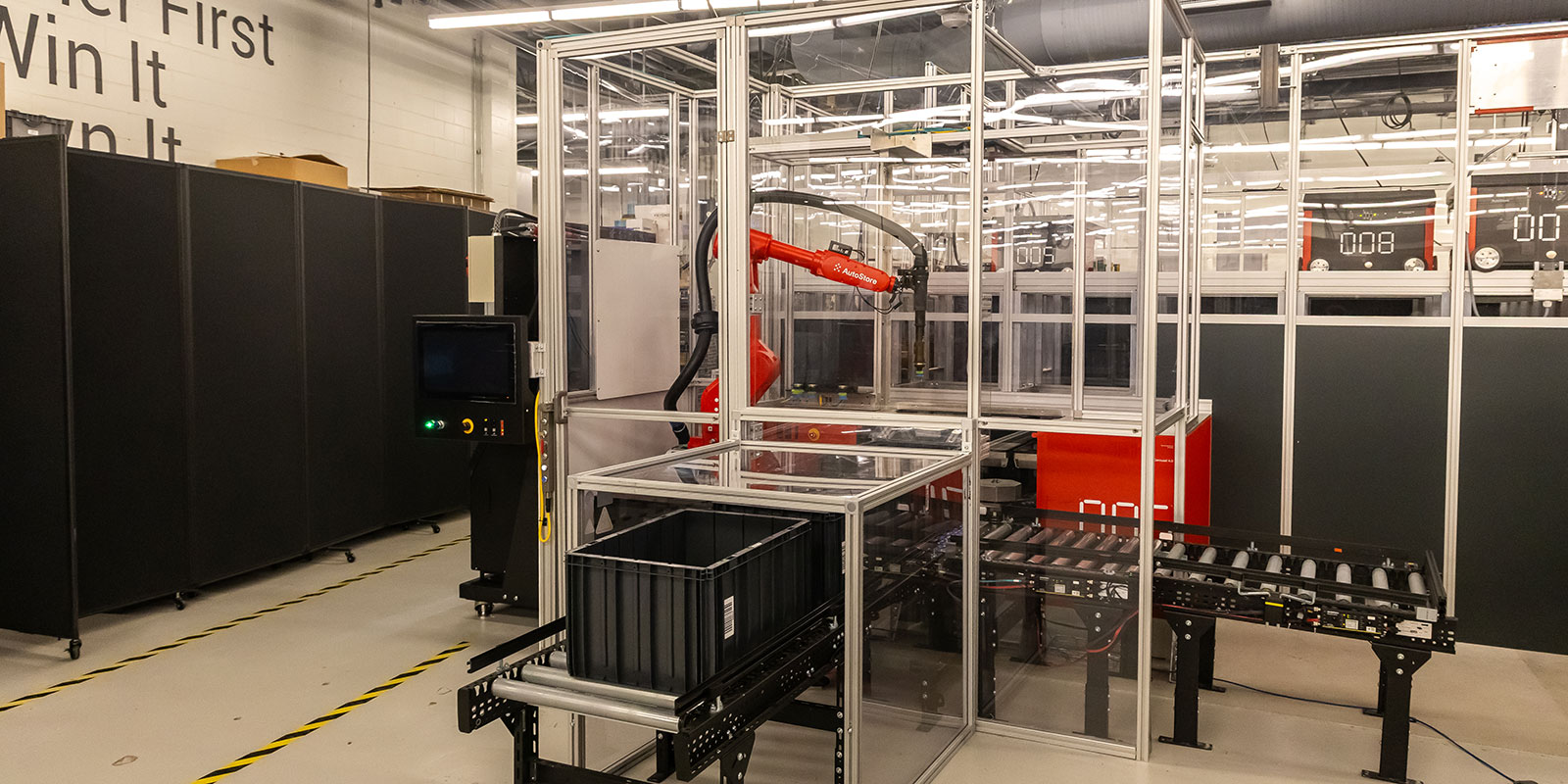 A full view of the CarouselAI demonstration setup at Berkshire Grey, connected to a fully-functioning AutoStore ASRS module. Although shortened for the demo, conveyors into and out of the pick station can be lengthened and integrated.

 

Photo by Donald Halsing | Peerless Media
