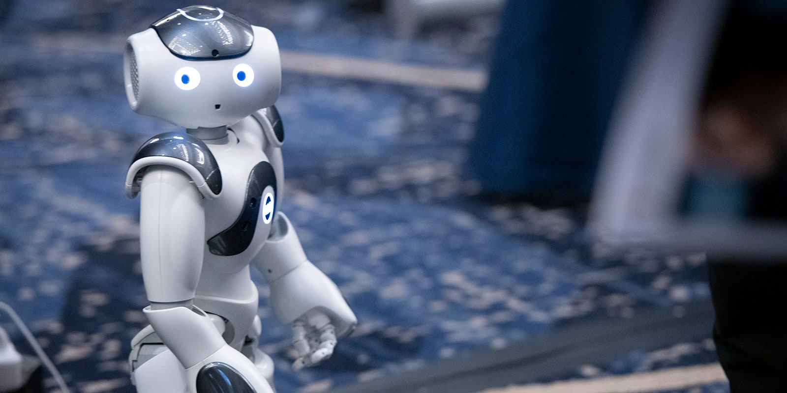 ​Bipedal and quadruped robots, including the miniature humanoid robot here, were the main talking points at the 2025 Humanoid Forum in Seattle.