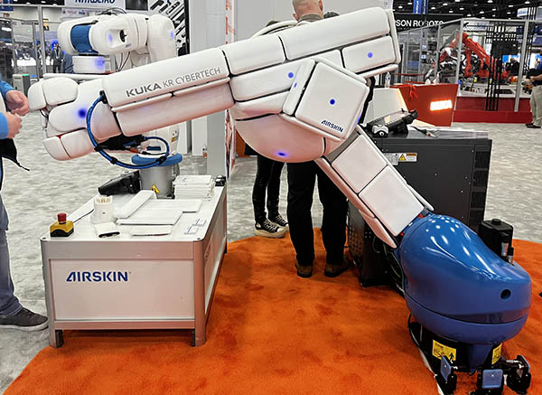 As cobots continue to get bigger and take on higher payloads, industrial robot arms are being outfitted with sensors and other components to make them safer and more capable of collaborative applications.

At KUKA‘s booth, Michael Koren, a sales manager at Blue Danube Robotics, demonstrated the company’s pressure-sensitive AirSkin technology on two KUKA robot arms. He used the Agilus 2 and the Cybertech, which have payload capacities of 9 kg (19 lb.) and 20 kg (44 lb.), respectively. 

The system is made up of modular white covers that can be custom designed to fit on a robot arm, Koren explained. The pads feature sensors that allow them to detect pressure changes when they are touched, and they communicate with each other every 4 milliseconds, according to Blue Danube. The system can also be installed on end-of-arm tools.

AirSkin allows robots to operate more safely with humans, Koren claimed. Blue Danube said that, with its skin, industrial robot arms can become compliant with ISO 10218 and ISO/TS 15066 safety standards. 

“We pretty much turn an industrial robot into a cobot,” Koren said. 



The Vienna-based company partnered with KUKA to help showcase the technology at Automate, but its system also works with robots from other vendors, including Staubli, Epson, and Universal Robots. 