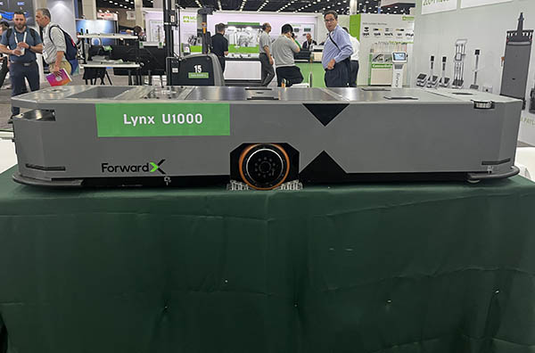 While ForwardX made its North American debut at ProMat in March, it still had some news to share at Automate. The company unveiled for the first time in the U.S. its Lynx heavy-duty AMR. The tugger can carry payloads up to 3,306 lb. With the Lynx, the company is going after the automotive market.

Automakers are increasing their investment in robotics as they develop new manufacturing processes to develop electric vehicles, the company noted. It’s hoping to capitalize on that demand with the Lynx. 



Using lidar-based SLAM (simultaneous localization and mapping) and deep-learning computer vision, the Lynx AMR is designed to complete heavy-duty rack-towing tasks. The robot is available in two configurations—the Lynx U100 and the Lynx 01500—which offer payload capacities of 240 kg (529 lb.) and 340 kg (749 lb.). 

Outside of the automotive market, the company is also seeing increased demand from its warehouse customers. 

“The mobile robot market is still expanding,” said Jennifer Samples, North America vice president at ForwardX Robotics. “One 3PL prospect has a facility with 800 job reqs, and forklift drivers need seven years’ experience. It has 30 to 40 lifts operating at a time. Demographics is driving demand.”