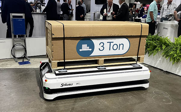 Staubli showcased its new AGV at Automate this year, which received a Red Dot Design Award. The company said the PF3 “features an ultra-compact yet robust design and handles payloads of up to 3 tons.” 

The company highlighted that the AGV can navigate and operate within narrow spaces and can carry out tasks with positioning precision of +/-5 mm. It is also equipped with safety sensors to allow it to operate with humans.



“The PF3 is also easy to own and maintain,” claimed Staubli. “It uses a ‘drawer’ maintenance concept, which means parts are easily accessible from the sides of the AGV and can be changed in minutes.”

“It is built on Stäubli’s unique patented drive unit and constructed of industrial-proof components, delivering outstanding performance in terms of productivity as well as total cost of ownership,” the company asserted.