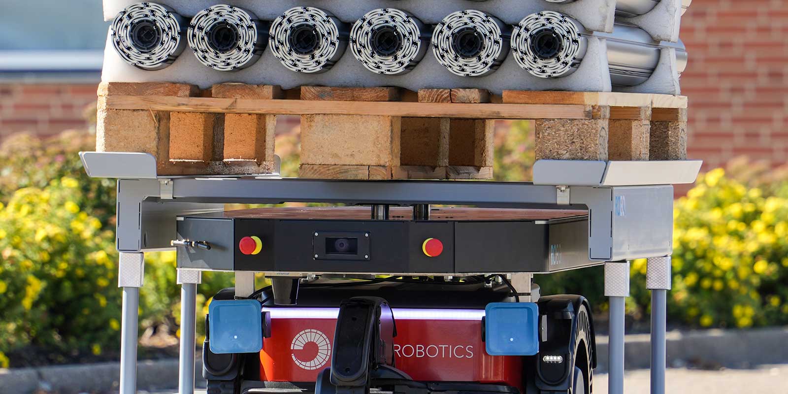 The Capra Carrier is an interlogistics material handling robot seamlessly bridging the gap between indoor and outdoor logistics. Transitioning from indoor to outdoor logistics still presents unique challenges for AMRs and AGVs. The robot and navigation system have an IP65 rating, are designed to operate in varying climate conditions and effortlessly navigate in strong sunlight, precipitation, low light and uneven terrain. This allows it to move goods safely and efficiently through even the most challenging and dynamic environments. Courtesy of the novel VSLAM system and high-precision docking, the robot supports automated loading and unloading of SLCs, racks, pallets and customer-specific packaging. Capra Carrier has a documented uptime of more than 10 hours and features automated charging, contributing to minimal downtime in operations. Capra Robotics, Booth N8556