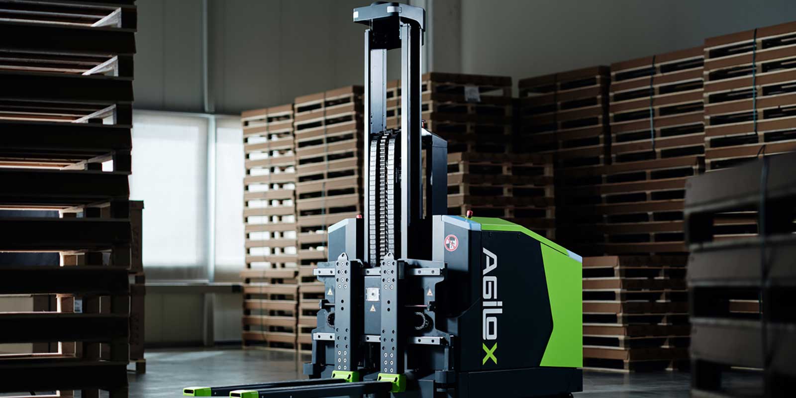 The AGILOX OCF is the counterbalanced powerhouse of its AMRs lineup, offering the highest load capacity - up to 1,500 kg/3,300 lbs to a maximum height of 1,600 mm/63 in. With its unique forklift system, OCF provides customers with maximum load carrier flexibility. Combined with the proprietary X-Swarm Technology, the robots move autonomously by navigating warehouses and production facilities while optimizing routes in real-time. OCF is equipped with mm-precision navigation capabilities using the contours of its surroundings to recognize and avoid obstacles. Supported by various sensors, including the safety laser scanner, and certified by TUEV SUED to comply with the UL 3100 safety standard, the AGILOX OCF navigates with precision through its environment. AGILOX, Booth N7553
