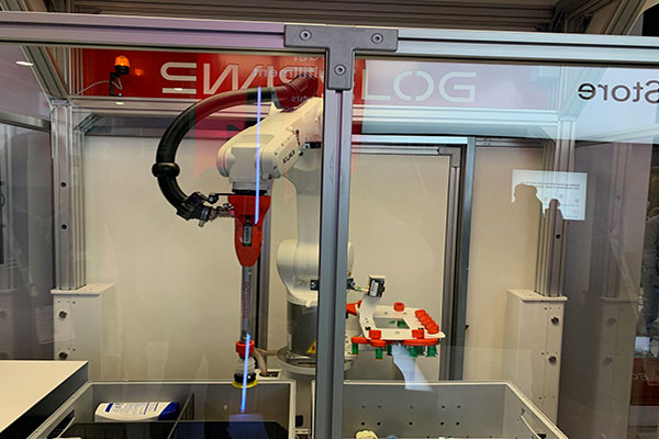 Swisslog had its ItemPiQ AI-powered robotic picker on display, handling multiple toiletry items. 