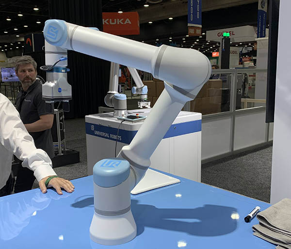 In addition to displays of collaborative robot applications with partners, Universal Robots A/S featured a “concept model” at the center of its Automate 2022 booth. The robot arm’s smooth exterior and coating were designed for wipe-down environments such as food handling or pharmaceuticals. The concept cobot isn’t sealed for full cleanroom or wash-down requirements. 

The concept is a new approach to get user feedback, said a representative for Universal Robots. Kim Povlsen, the new president of the Odense, Denmark-based company, is striving for transparency and early user input, he said.

Universal Robots had technicians on site for conversations with users about additional potential capabilities for future products. Its booth was divided into areas devoted to assembly, metal fabrication, metrology, and palletizing and packaging.

“In 2019, we showed demonstrations of applications, but now we’re showing real-world examples with partners,” said Joe Campbell, senior manager of strategic marketing and applications development at Universal Robots. “For example, Melton is showing automated TIG welding for the first time, using water-cooled systems and URCaps.”

Campbell also introduced Robotics 24/7 to Brian Knopp, founder of UR-certified systems integrator Cobot Systems. He showed the first U.S. demo of a cobot controlling an IPG LightWELD laser welder. It can weld items of different thicknesses and reduce jobs from 1.5 hours to six minutes, said Knopp.

 

In addition, Joshua Mayse, co-founder and vice president at UR partner Mid-Atlantic Machinery, showed how its Press Brake Operator Package can improve efficiency and safety.